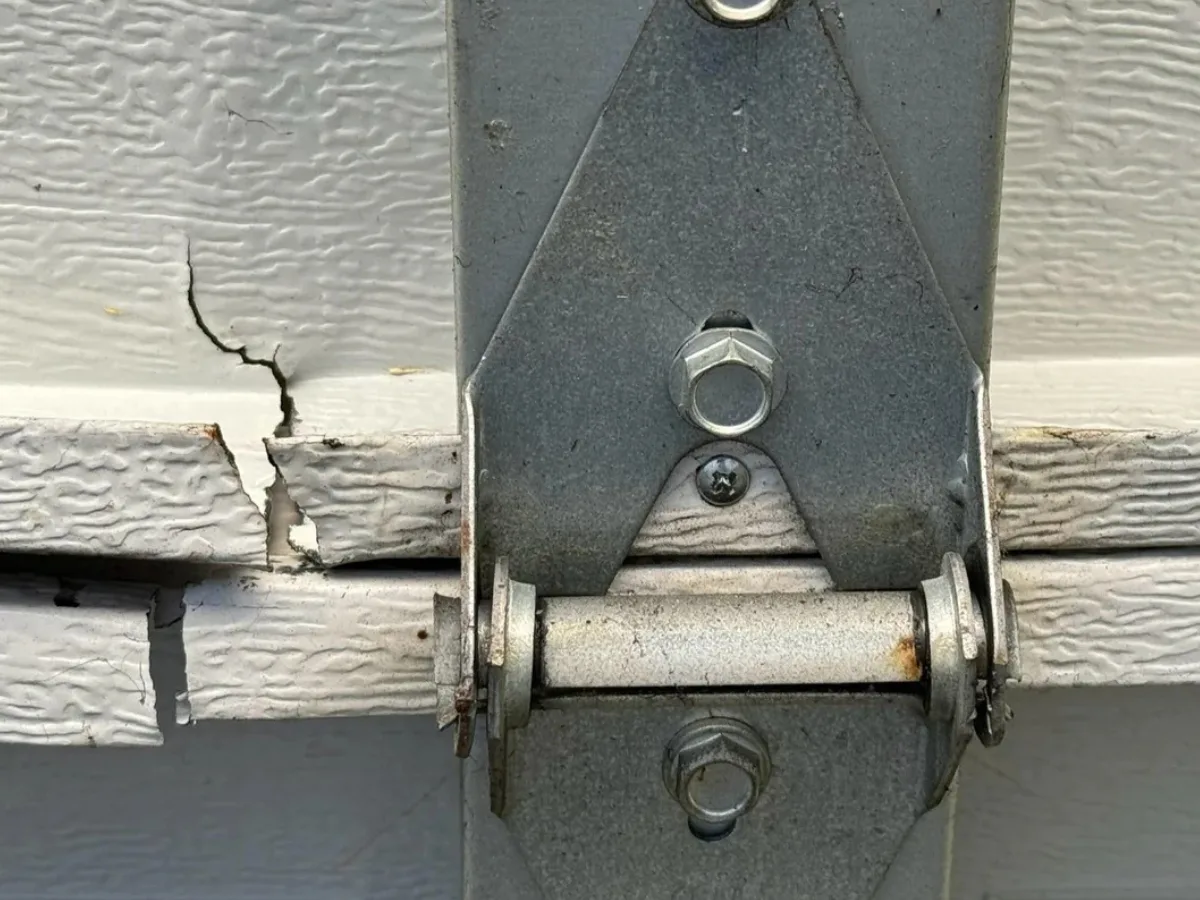 Garage door crack roller