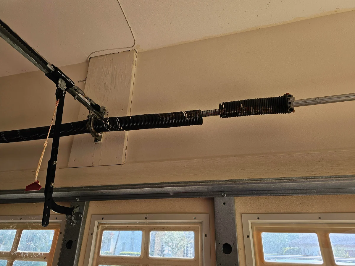 Garage door spring mechanism installed