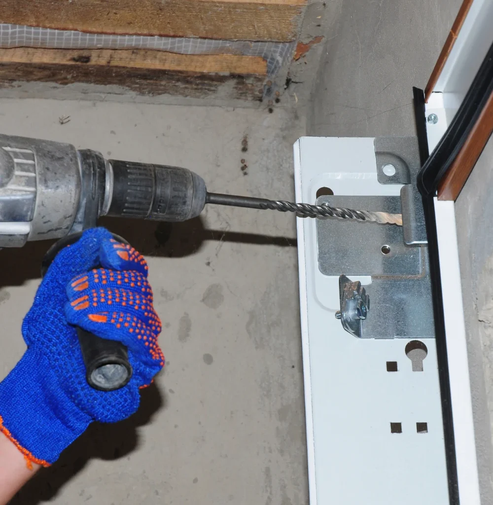 Person drilling into a wall